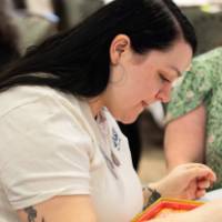 person concentrating on Operation game